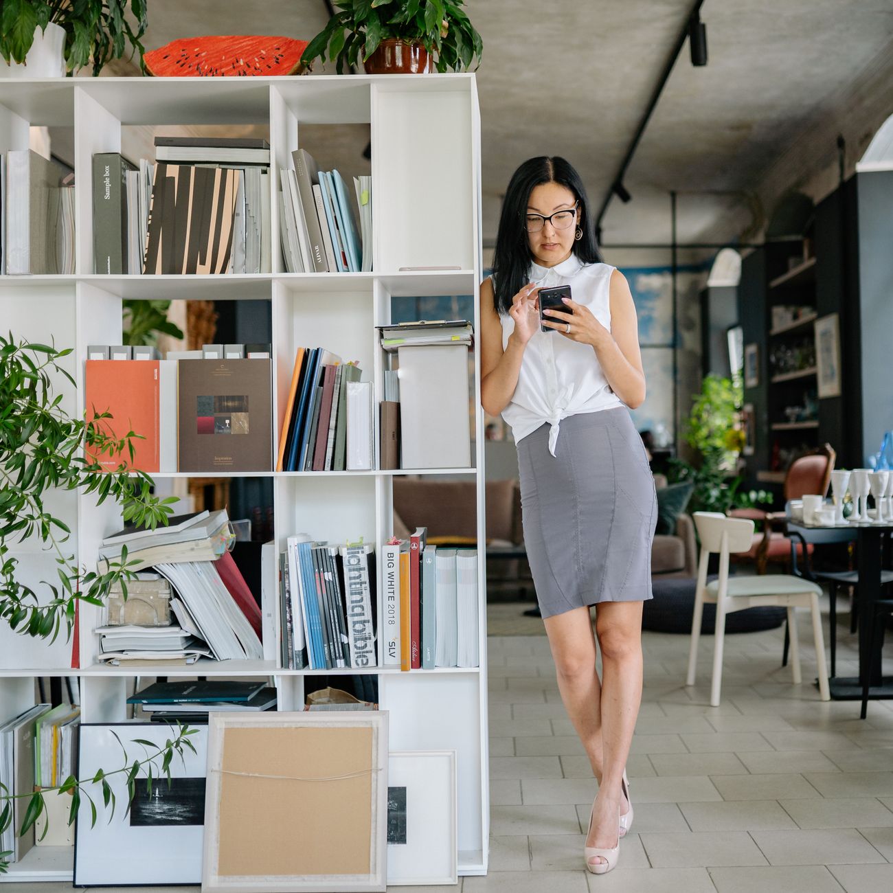 portrait of professional real estate investor in modern office with neutral interior